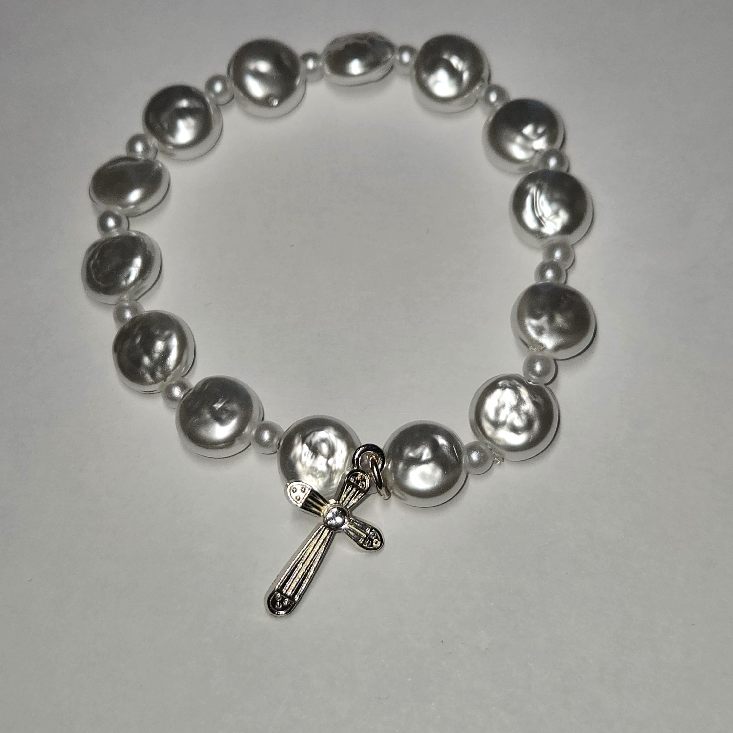 Elegant Silver Pearl Bracelet With Cross Charm